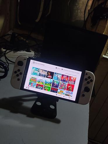 Nintendo Switch OLED: Nintendo Switch oled чипованная (прошитая) встроенная память 32гб+64гб — 4