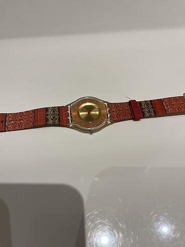 swatc: İşlənmiş, Qol saatı, Swatch, rəng - Qızılı — 1