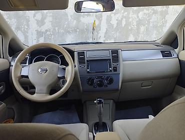 ucuz ford transit: Nissan Tiida: 1.6 l | Sedan — 10