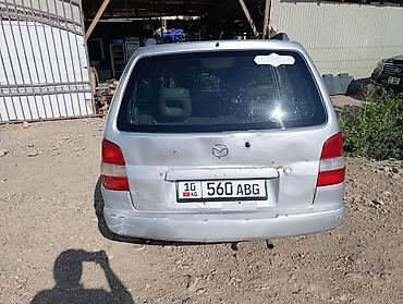 215 65 16 с: Mazda Demio (DW) — компактный хэтчбек/минивэн серебристого цвета с — 2