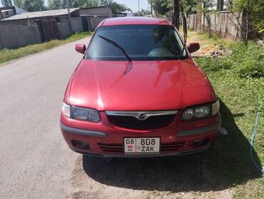 Транспорт: Mazda 626: 1997 г., 1.8 л, Механика, Бензин, Седан