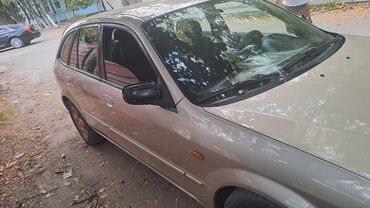 автомашина мазда: Mazda 323: 2001 г., 1.6 л, Механика, Бензин, Купе