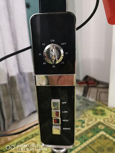 spiral yay: Günəbaxan naxışlı şaquli elektrik sobası (infraqırmızı/halojen tipli — 2
