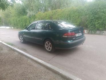 a8 d2: Mazda 626: 1997 г., 2 л, Механика, Бензин, Седан — 3