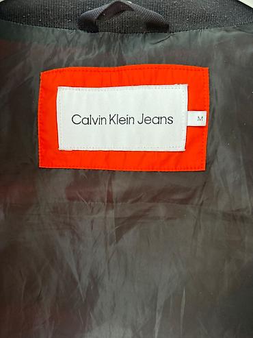 crivit helanke: Prodajem original Calvin Klein muški prsluk, narandžaste boje — 6