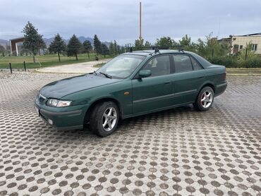 шины 2356516c: Mazda 626: 1997 г., 1.8 л, Механика, Бензин, Седан
