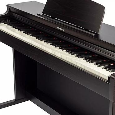 electron piano: №: 12712 Məhsulun adı: Medeli UP203 BK elektron piano (qara) Brend — 2