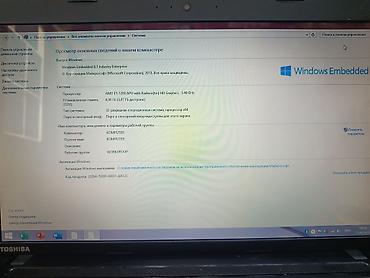 Toshiba: Toshiba noutbuk satılır. Əsas xüsusiyyətlər: - Prosessor: AMD E1-1200 — 7