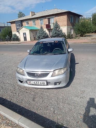 мазда 323 1990: Mazda 323: 2001 г., Механика, Бензин, Седан — 1