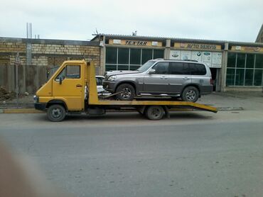 Evakuatorlar: Sarı rəngli evakuator, nəqliyyat vasitələrini daşımaq üçün nəzərdə — 9