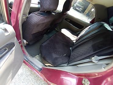 lasvit 1998: Kia Avella: 1.5 l | 1998 il Sedan — 2