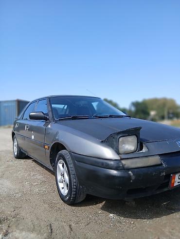 аксессуары для авто: Mazda 323: 1991 г., 1.8 л, Механика, Бензин, Хэтчбэк — 2