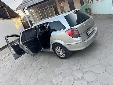 кузов е39: Opel Astra: 2013 г., Механика, Бензин, Универсал — 3