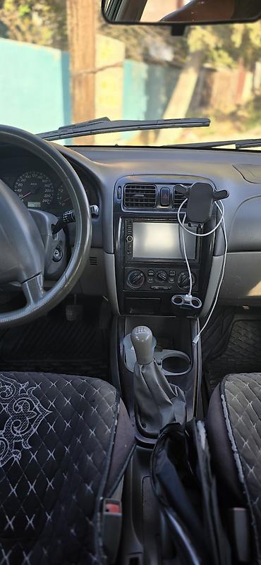 япония машина: Mazda Capella: 2000 г., 2 л, Механика, Бензин, Универсал — 6