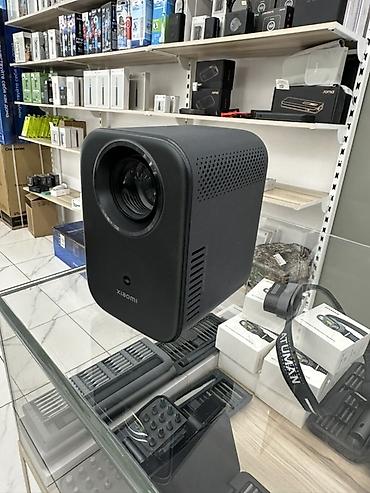 mini pc: Проектор Xiaomi L1— компактный домашний кинотеатр с автофокусом — 1