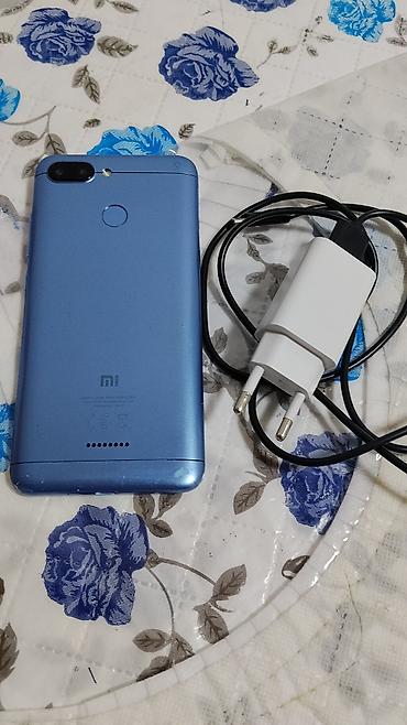 telefon naftalan: Redmi 32 GB, rəng - Göy, Barmaq izi — 2