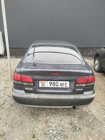 124 e500: Mazda 626: 1997 г., 2 л, Механика, Бензин, Хэтчбэк — 4