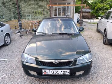 мтз 92 2: Mazda 323: 1998 г., 1.5 л, Механика, Газ, Хэтчбэк