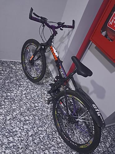 İdman velosipedləri: Velone markalı qatlanan dağ velosipedi Velosiped qara rəngdədir və — 2