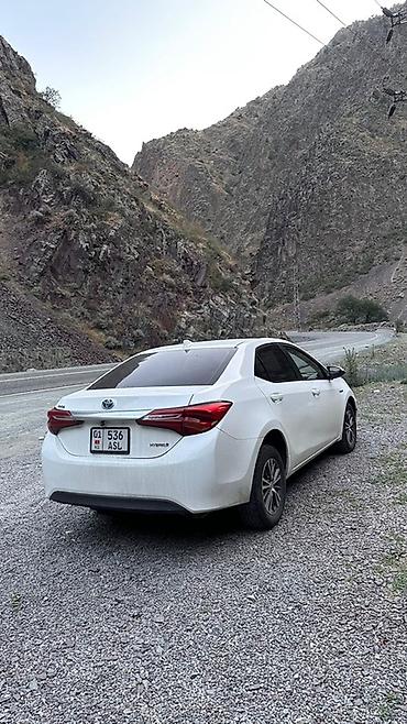 toyota corola verso: Toyota Corolla: 2016 г., 1.8 л, Вариатор, Гибрид, Седан — 2