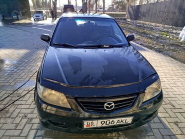 прирора машина: Mazda 323: 2002 г., 1.3 л, Механика, Бензин, Хэтчбэк