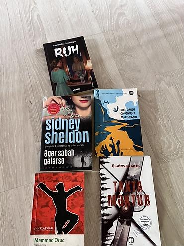 Художественная литература: Müxtəlif janrları əhatə edən böyük kitab dəsti. Dəstdə görünən — 2