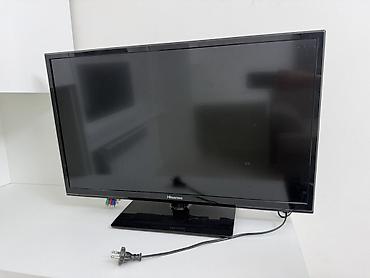 dekko plus: Телевизор Hisense, диагональ около 24–27". Плоская ЖК‑панель с тонкой — 1