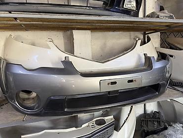 Передний бампер для Nissan Qashqai (J10, дорестайлинг). - Цвет