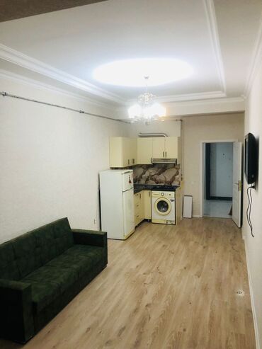 Uzunmüddətli kirayə mənzillər: 2 otaqlı mənzil – studiya mətbəxli - Geniş zal və mətbəx bir yerdə — 1