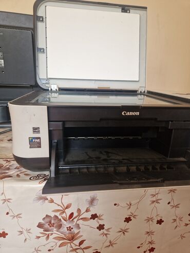 canon принтер 3 в 1: Многофункциональный принтер Canon, выполненный в сочетании черного и
