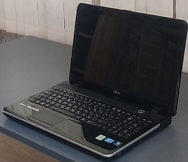 internet data: Fujitsu Lifebook noutbuku - Ekran: 15.6" parlaq (glossy) panel, geniş — 1