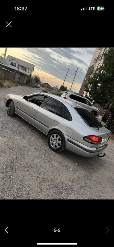 купить запчасти на опель вектра б: Mazda 626: 1998 г., 1.8 л, Механика, Бензин, Седан