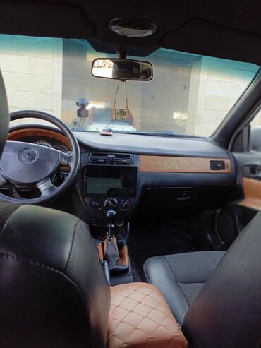 Daewoo: Daewoo Gentra: 1.5 l | 2014 il Sedan — 5