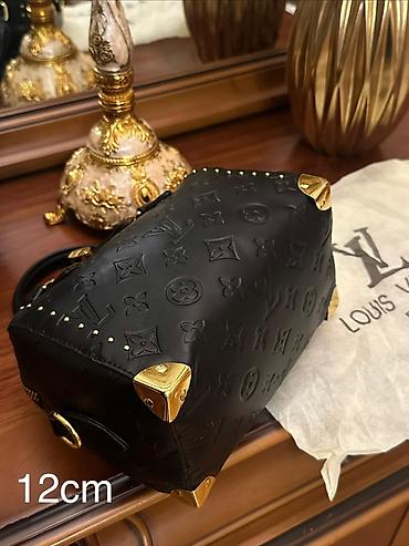 Çantalar: Əl çantası, Louis Vuitton — 1