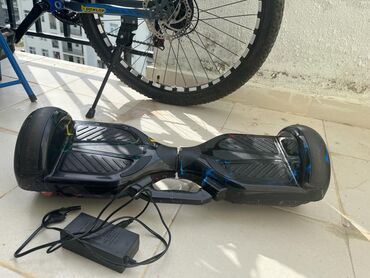 elektrikli skuterlər: Adapter və çantası verilir musiqidə qoşmaq olur real alıcılar yazsın