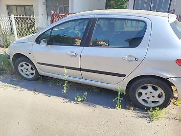hsr 140: Peugeot 307, 5 vrata, srebrna boja. Benzin/dizel nepoznato sa ručnim — 1