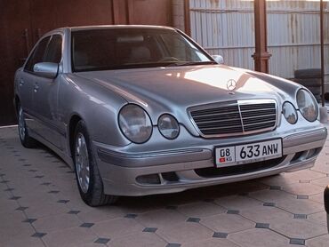 mercedes benz w210 amg: Автомобиль Mercedes-Benz E-класса в кузове W210 серебристого цвета
