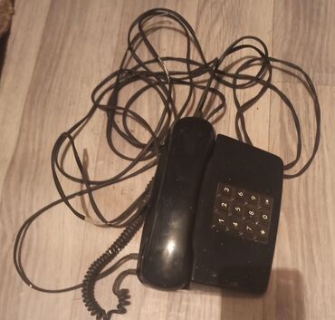 retro ev telefonu: Stasionar telefon İşlənmiş, Ünvandan götürmə