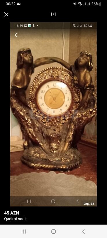 qızıl qol saatı: Антикварные часы
