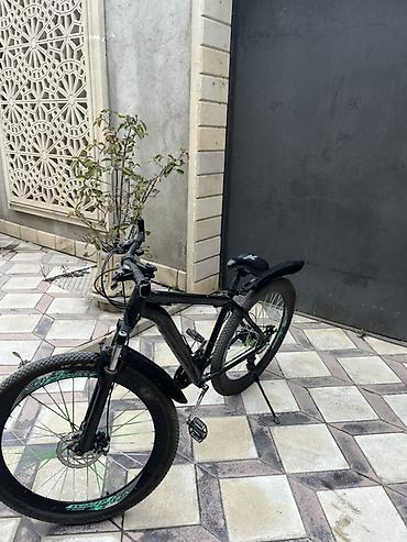 Dağ velosipedi – 29” təkər, disk əyləclər, amortizatorlu ön çəngəl -
