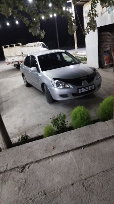 красные машины: Mitsubishi Lancer: 2005 г., 1.6 л, Автомат, Бензин, Седан