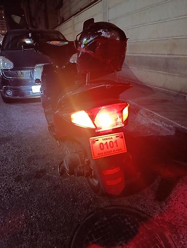 cross moto 125: Maped - Rəng: qırmızı-qara, xüsusi “splash” dizaynlı kuzov - Ön — 3