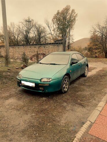 автомобиль пассат: Mazda 323: 1997 г., 1.5 л, Механика, Бензин, Хетчбек