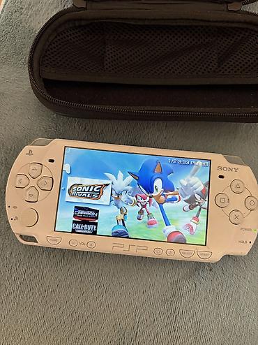 pes 5: Sony PSP-3000, ağ rəng (UMD sürücülü, PSP loqolu arxa qapaq). Portativ — 4