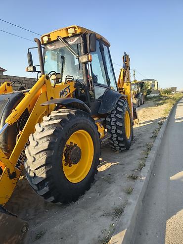 MST ekskavator-yükləyici (bekho loader) prablemsiz di most mator