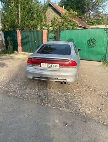 зарядное устройство для автомобильного аккумулятора: Mazda 626: 1991 г., 2.5 л, Механика, Бензин, Седан