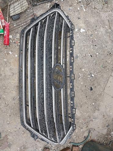 radiator barmaqlığı: Məhsul: Avtomobilin ön radiator barmaqlığı (panjur) Təsvir: - — 1
