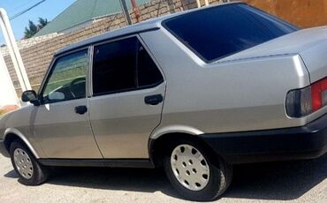 Perodua: Model: Sedan, 4 qapı Rəng: Gümüşü (metalik) Kuzov: Künc xətli