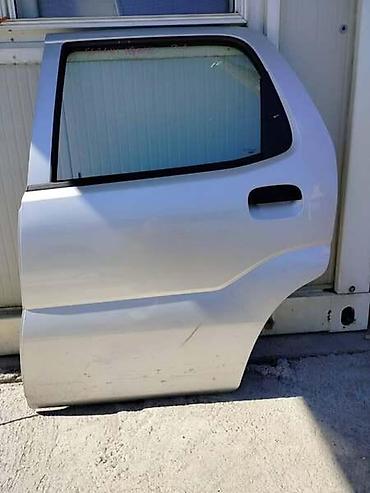 bež: ZADNJA LEVA VRATA ZA SUZUKI IGNIS OD 2003. DO 2008. GOD. | Zadnja — 1