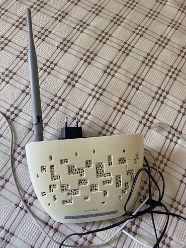 Электроника: Wi-Fi роутер с ADSL2+ модемом для работы через телефонную линию